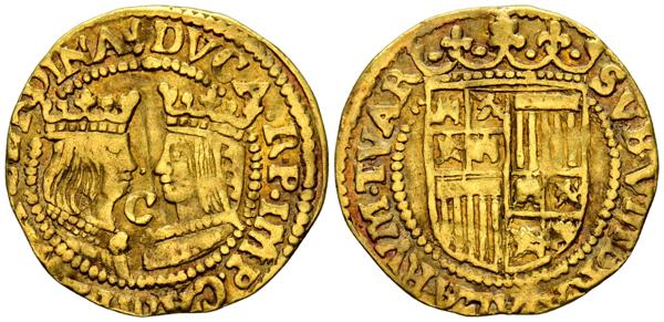 18 - FELIPE II (1555-1598). Ducado. (Au. 3,35g/23mm). 1590 (ca.). Campen. (Vicenti 7). C y punto entre los bustos de los Reyes Católicos. MBC+. Precioso tono. Rara.<BR><BR>Este tipo de piezas, que enfrentan los bustos de Fernando e Isabel, son conocidas como de dos caras y las encontramos acuñadas durante el reinado de Felipe II con la leyenda alusiva a los propios Reyes Católicos, como es el caso, o bien al propio Felipe (PHS R. HISP). Noveladas por el mismísimo Cervantes, en su obra La Gitanilla podemos leer: “ Que aquí tengo un doblón de dos caras que ninguna es como la vuestra aunque son de reyes». - 800€